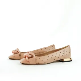 Perforated leather ballerina with chain accessory.